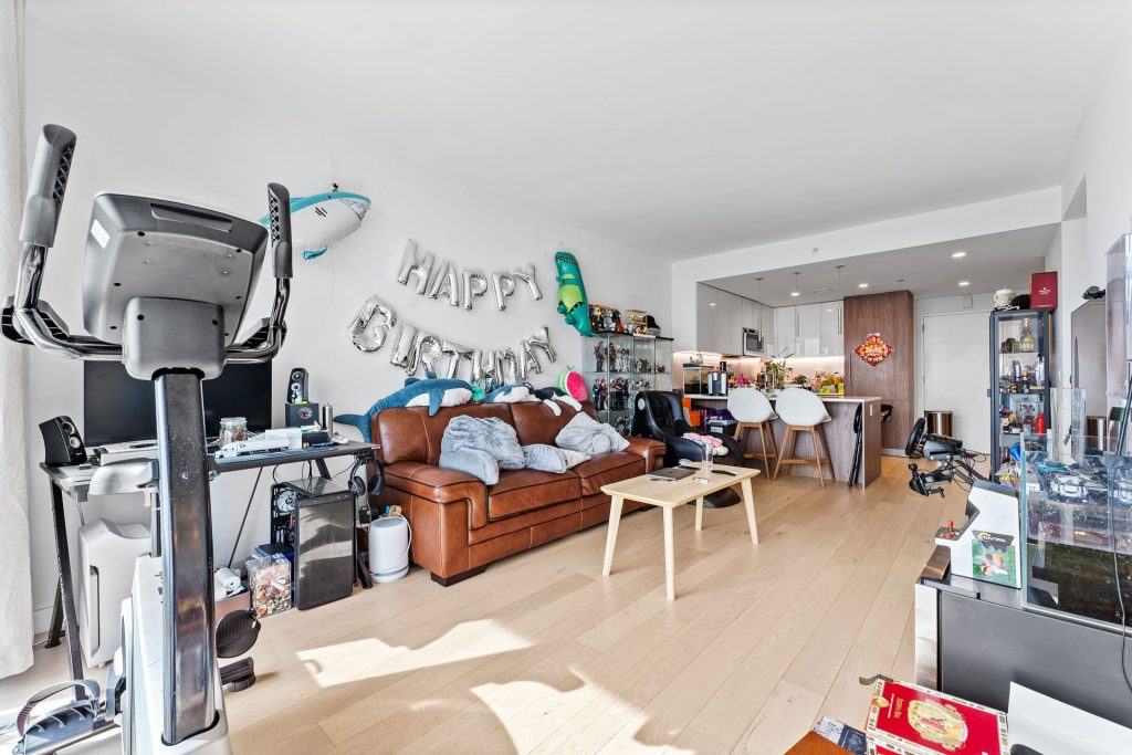 Cluttered living room before photo editing